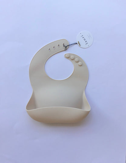 Silicone Baby Bib with pouch, BPA free, non-toxic, earthy natural colours and tones, cream, nude colour, Milk, light beige cream colour Lauri Australia