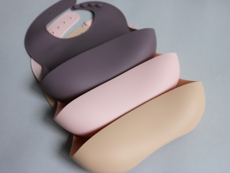 Silicone Baby Bib with pouch, BPA free, non-toxic, earthy natural colours and tones, cream, purple mauve, sage green